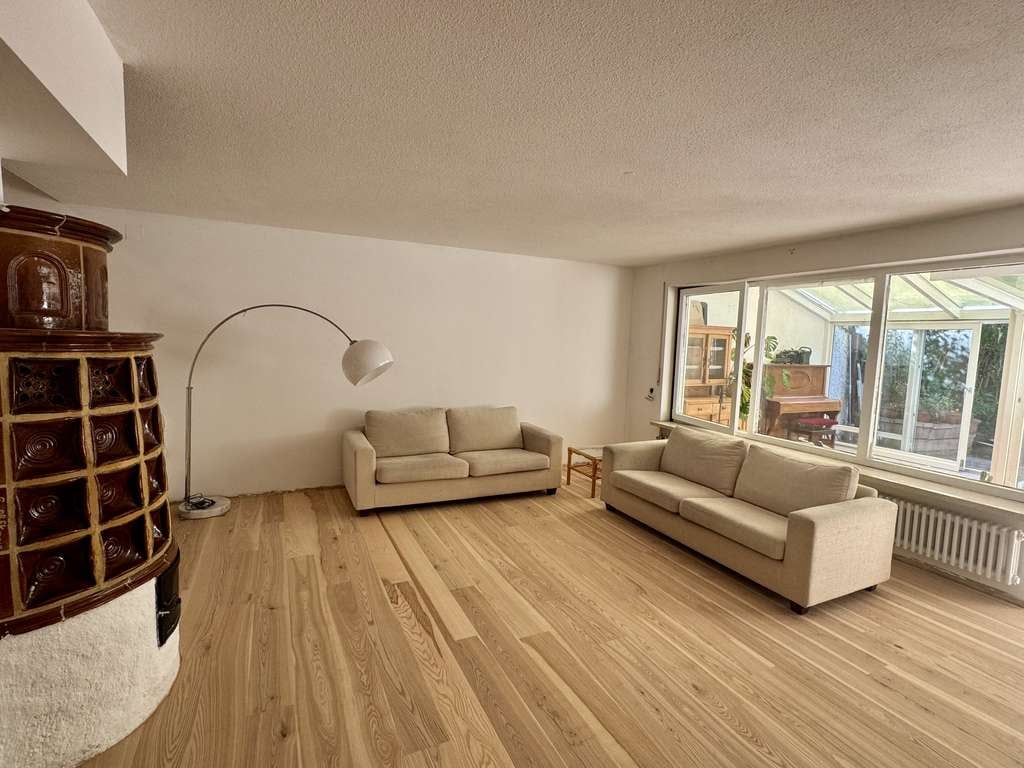 Immobilie in Ebersberg - Mehr Raum für das Familienleben - lichtdurchflutetes Split-Level-Zuhause mit Seeblick - Bild 2