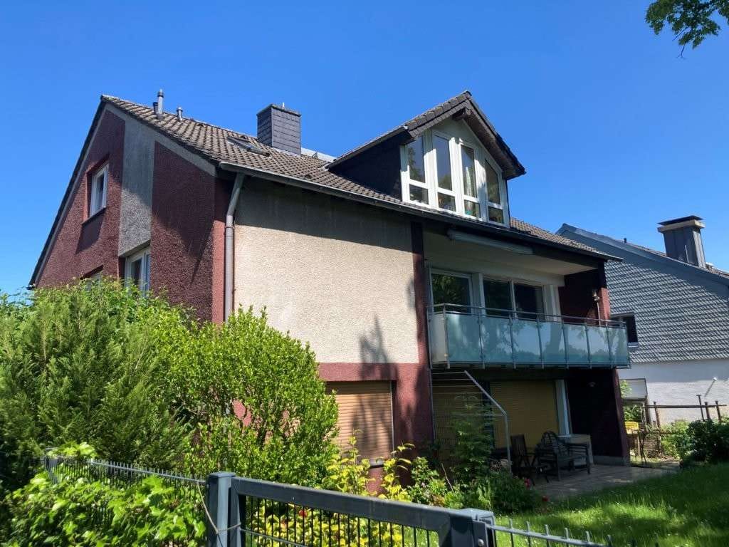 Immobilie in Holzwickede - Viel Platz für Ihre Pläne: Mehrfamilienhaus mit 3 WE in Holzwickede, 272 m² WFL, 98 m² KG - Bild 1