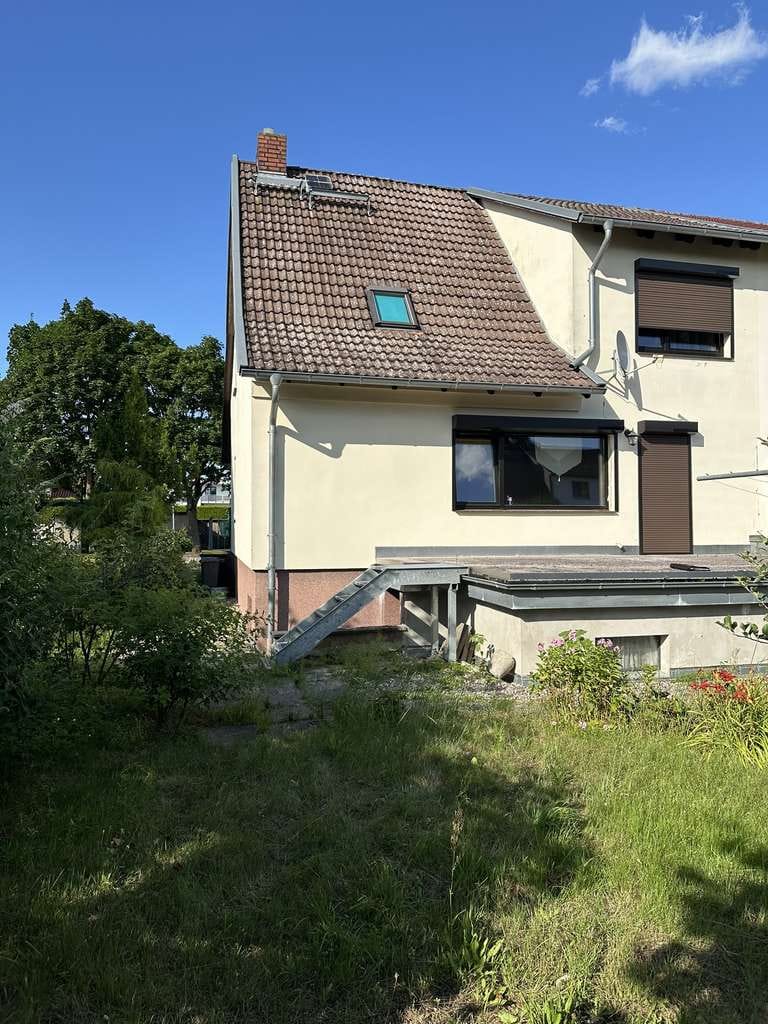 Immobilie in Parchim - Doppelhaushälfte mit Kamin, Terrasse und Tiefgarage - Bild 2