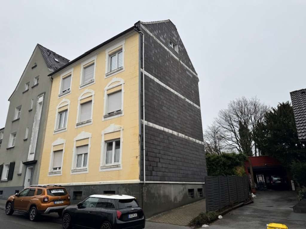 Immobilie in Solingen - Solides Mehrfamilienhaus mit 4 Wohnungen, Hof und Nebengebäude in Solingen-Höhscheid. - Bild 0