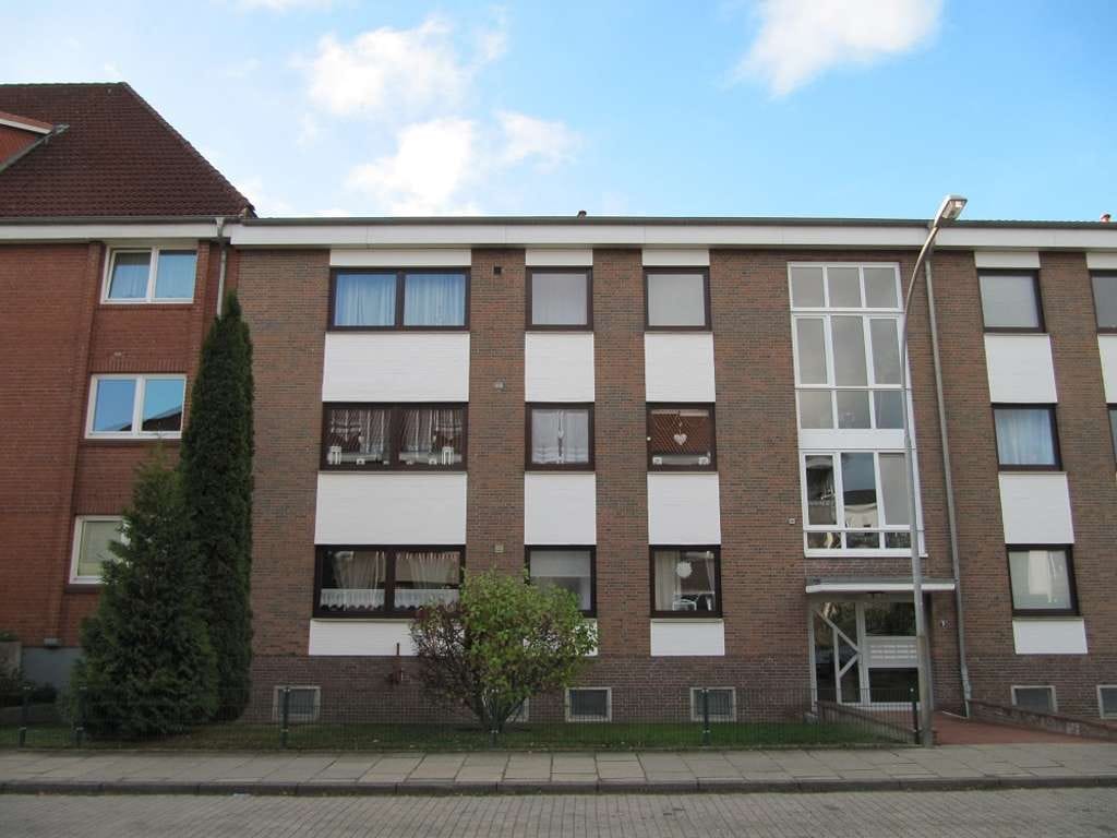 Immobilie in Bad Bramstedt - Vermietete Eigentumswohnung mit Balkon und Garage - Bild 0