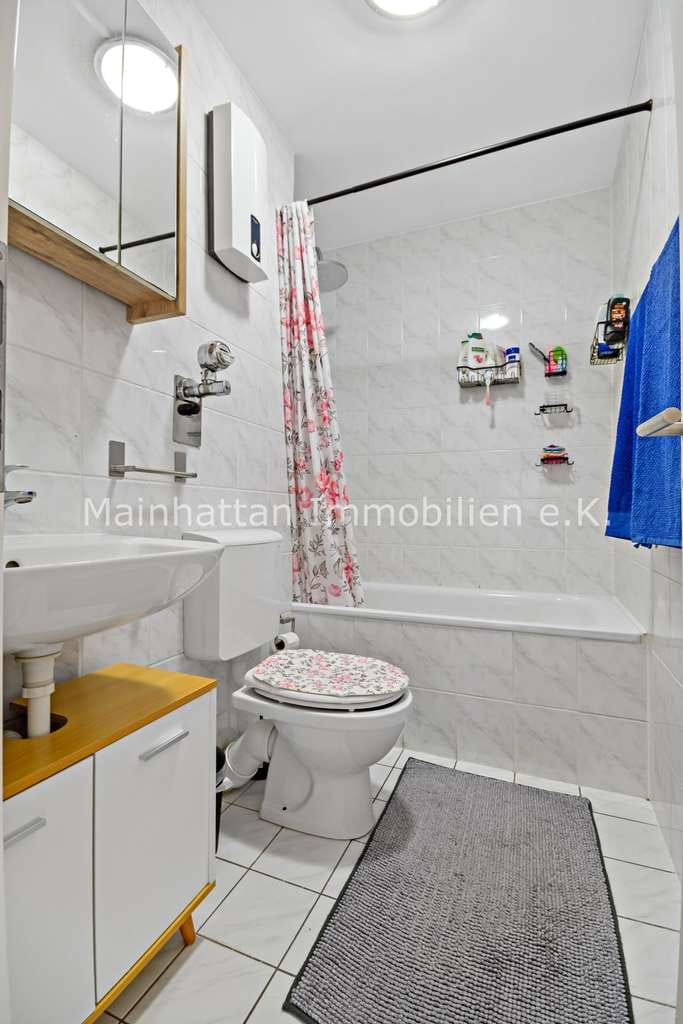 Immobilie in Hattersheim - Planbare Mieteinnahmen statt Risiko …vermietete 2 Zimmerwohnung mit Balkon und Weitblick - Bild 3