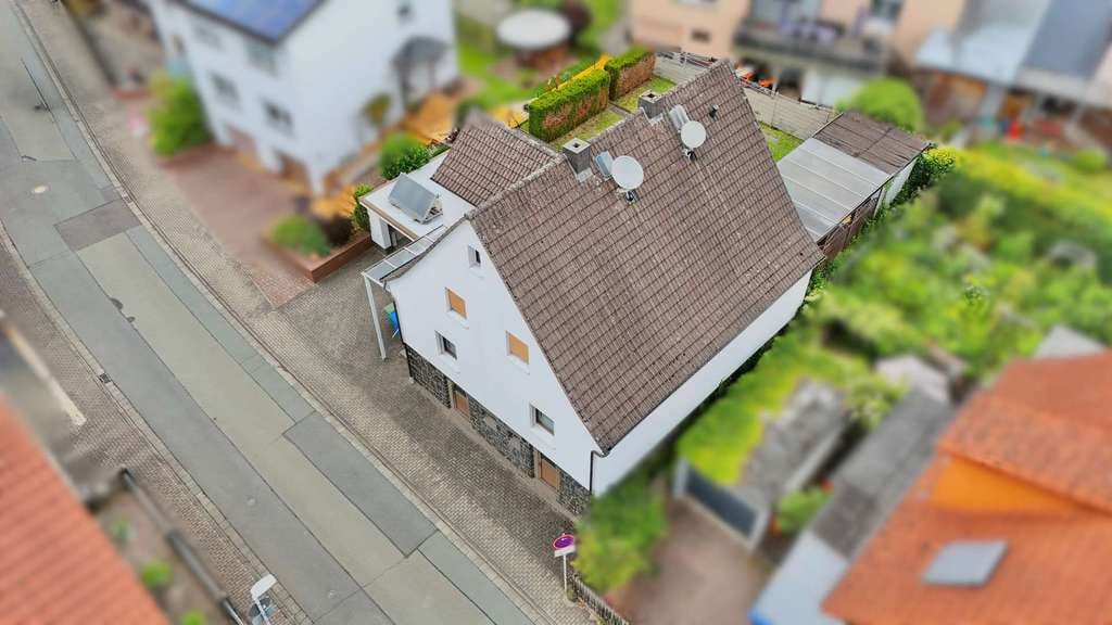 Immobilie in Gladenbach - Sonniges Einfamilienhaus mit Garten in Gladenbach OT - Bild 1