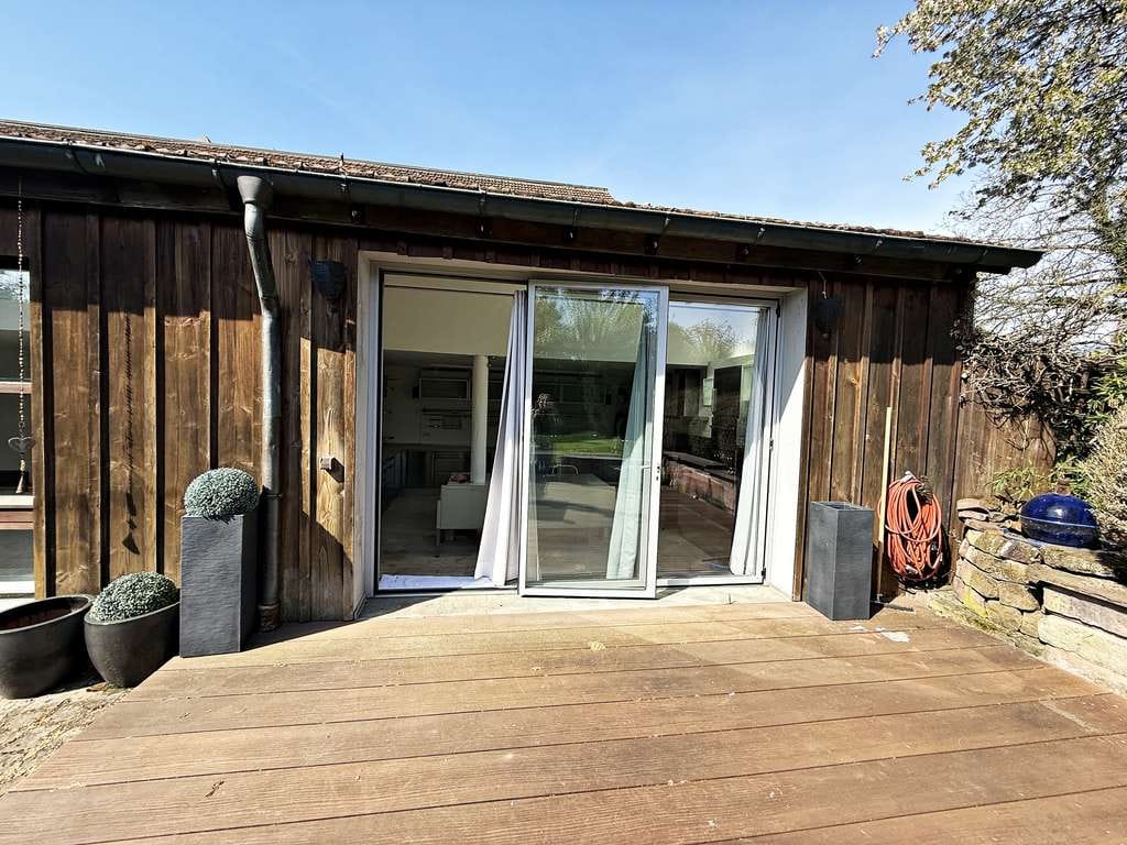 Immobilie in Steinfeld - Steinfeld: außergewöhnliche Maisonette-Wohnung mit eigenem großen Garten, Terrasse und Hof - Bild 1