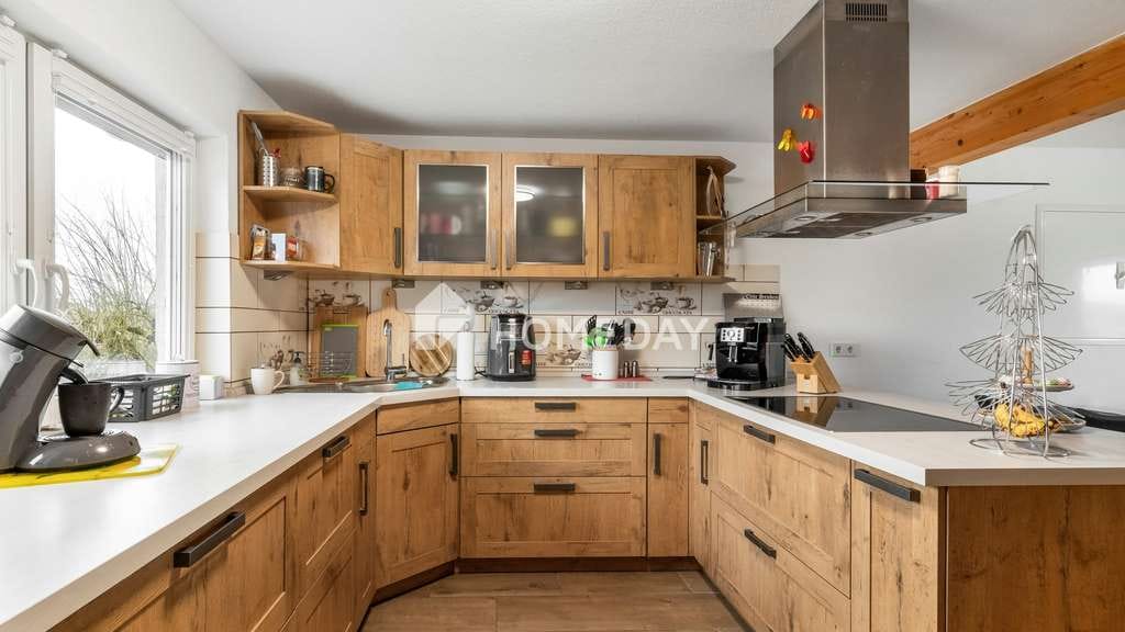 Immobilie in Weißenhorn - Großzügige 3-Zimmer-Wohnung mit zwei Balkonen und Kamin - Bild 2
