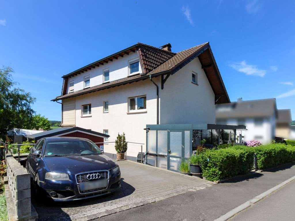 Immobilie in Neuhof - Großzügiges und gepflegtes 3-Familienhaus in Hattenhof - Bild 1