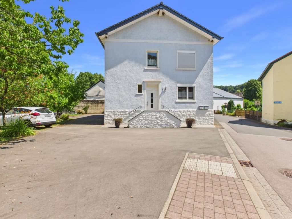 Immobilie in Hüttingen bei Lahr - Wohnen und Vermieten – Gepflegtes Zweifamilienhaus in Hüttingen bei Lahr - Bild 1