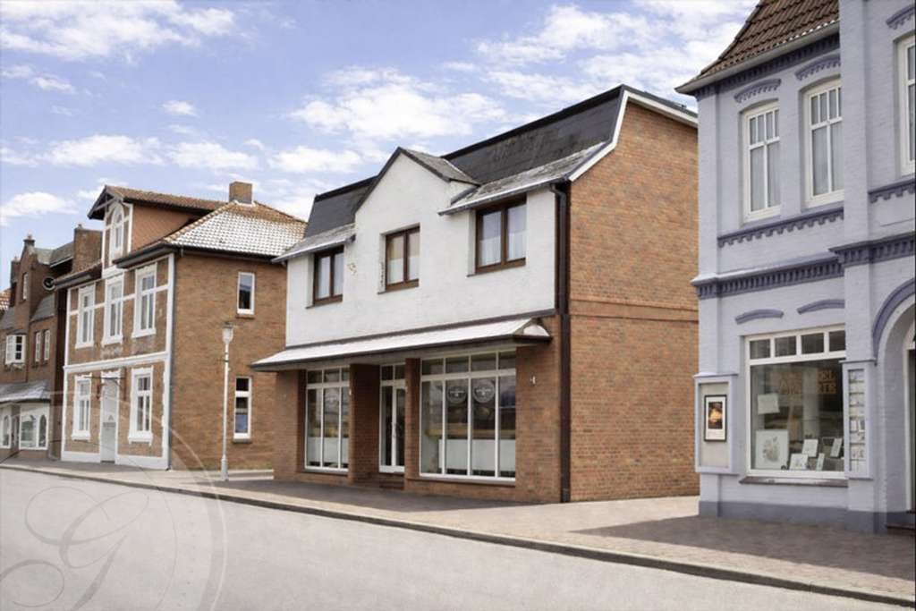 Immobilie in Wittdün auf Amrum - Gi - Solides Mehrfamilienhaus mit Gewerbeanteil - Bild 1