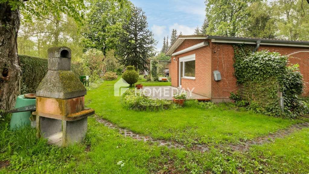 Immobilie in Sundhagen - Ebenerdiges Wohnen im Grünen – gepflegter Bungalow auf großem 1550 m² Naturgrundstück - Bild 2