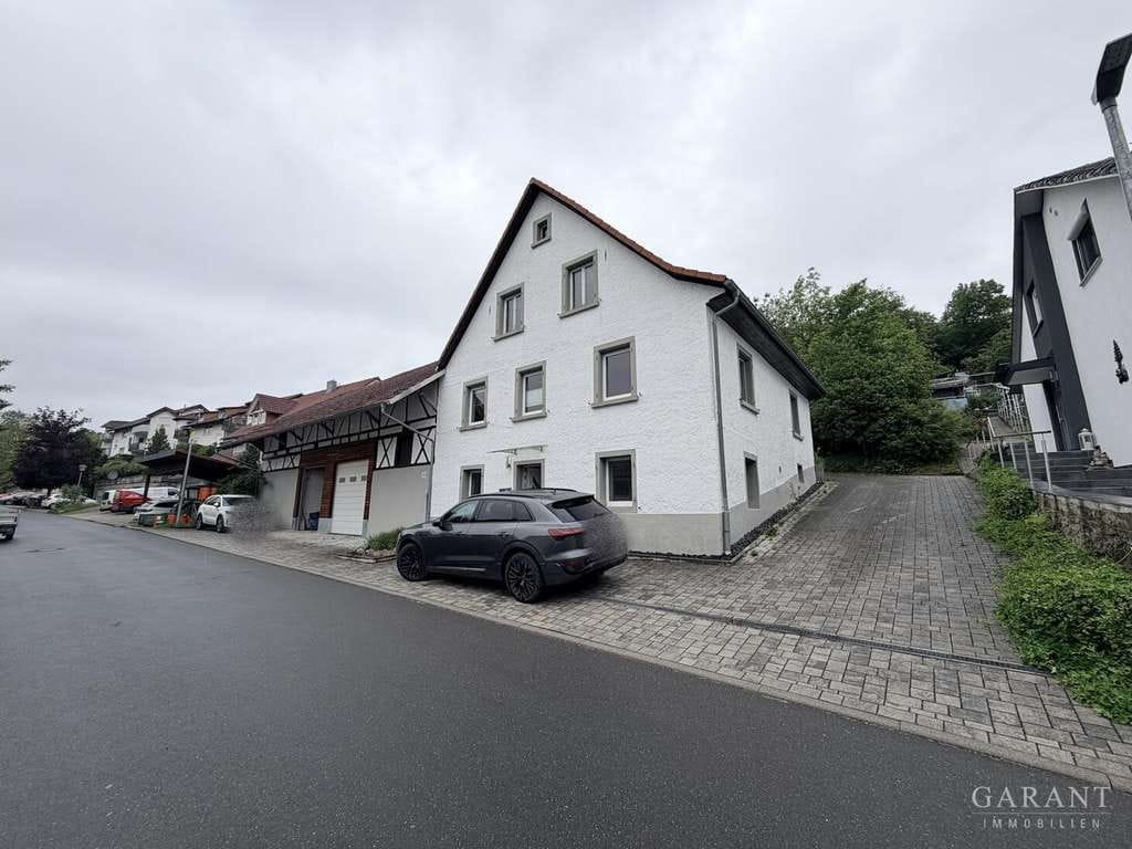 Immobilie in Krautheim - Charmantes Einfamilienhaus mit Scheune und Ausbaupotenzial - Bild 0
