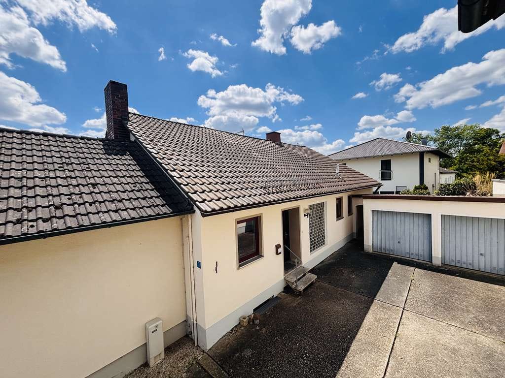 Immobilie in Marklkofen - Lichtdurchflutetes Ein- oder Zweifamilienhaus mit Seeblick am Vilstalsee in 84163 Steinberg - Bild 1