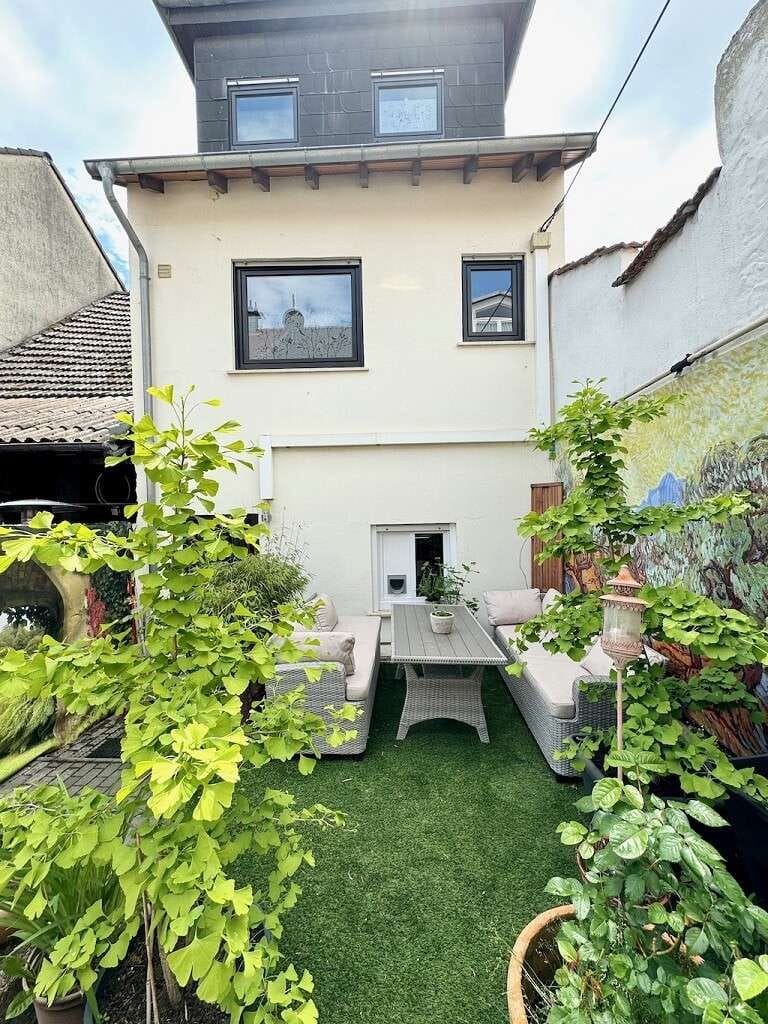 Immobilie in Partenheim - Modernisiertes Häuschen mit Terrassengarten und Balkon - 
ziehen Sie einfach ein - Bild 1