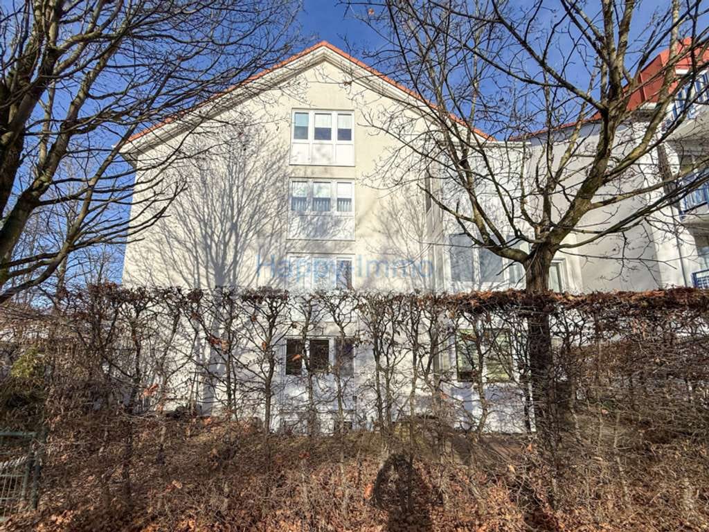 Immobilie in Poing - bezugsfreie 2 Zimmerwhg mit Wintergarten, eigenen Garten, Hobbyraum, TG und oberirdischen Stellplatz - Bild 1