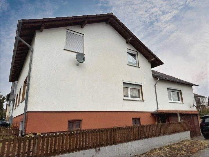 Immobilie in Schenklengsfeld - Zweifamilienhaus mit Garage im sonnigen Schenklengsfeld - Bild 2