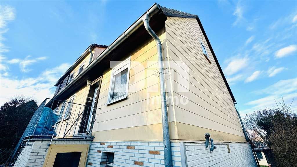 Immobilie in Habichtswald - Schöne Doppelhaushälfte mit Nebengebäude, Garage und angelegtem Gartenbereich - Bild 2