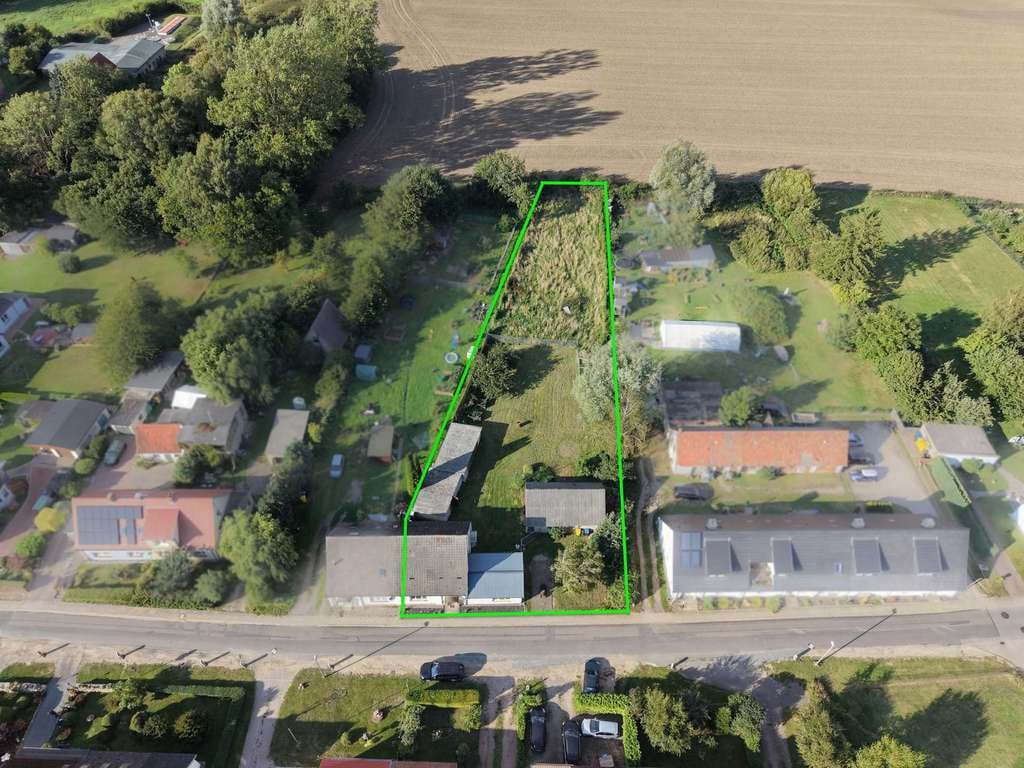 Immobilie in Kröpelin - Doppelhaushälfte mit Ausbaureserve und sehr großzügigem Grundstück - Bild 2