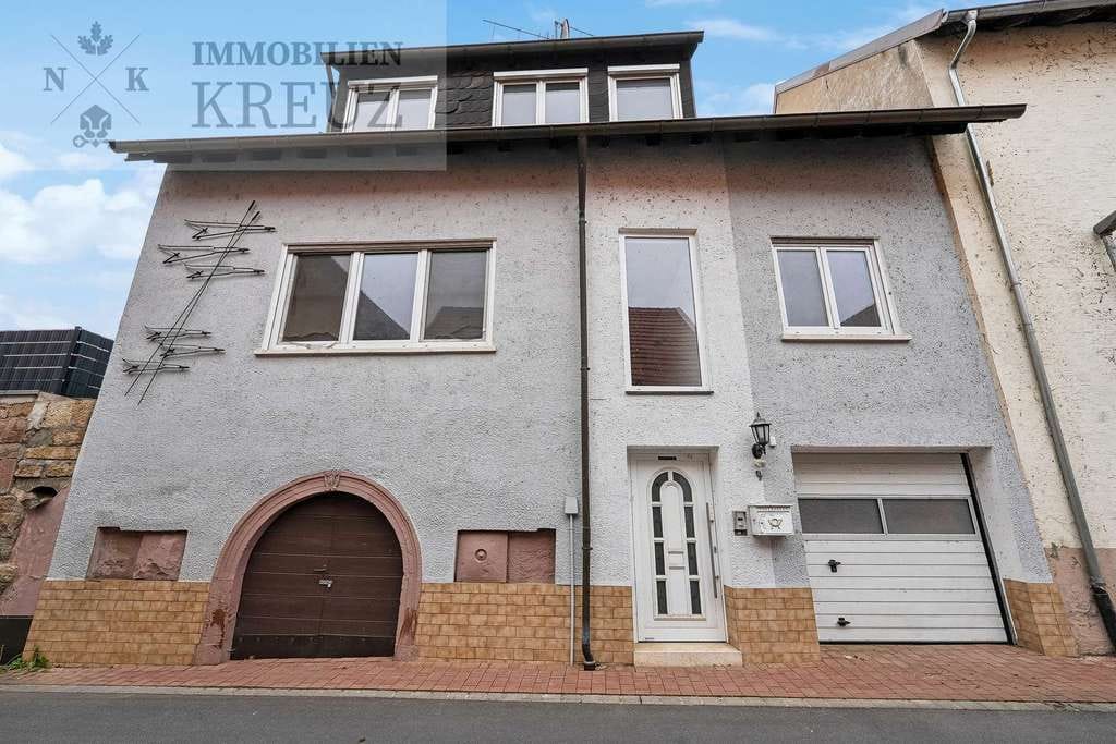 Immobilie in Tauberbischofsheim - Umfangreich modernisiertes Einfamilienhaus mit Garage in Tauberbischofsheim-Hochhausen - Bild 1