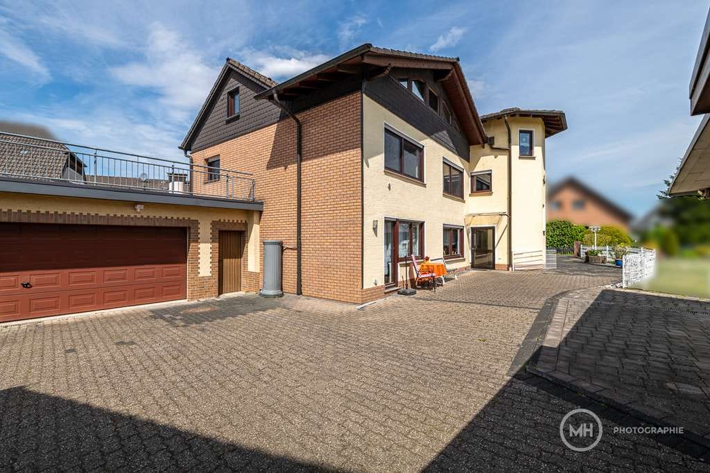 Immobilie in Hennef (Sieg) - MANNELLA *Mehr Platz fürs Leben* Gepflegtes Zweifamilienhaus mit vielseitigen Nutzungsmöglichkeiten. - Bild 3