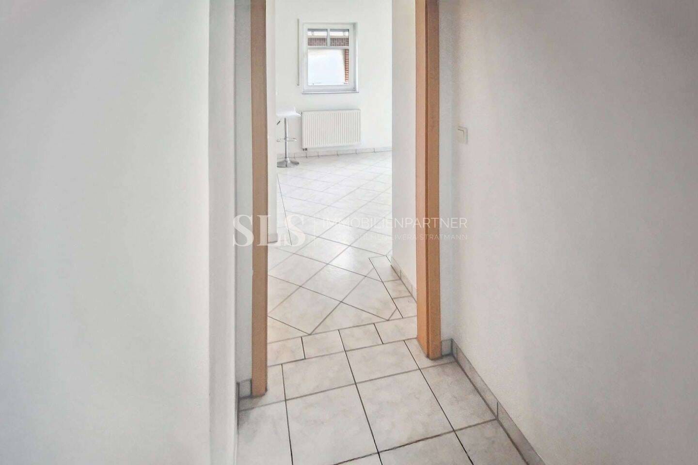 Immobilie in Raesfeld - Lichtdurchflutete Wohnung mit Balkon, offenem Wohnen, Stellplatz und langfristig gesicherter Miete - Bild 4