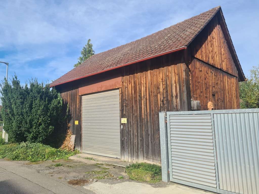 Immobilie in Illingen - Einfamilienhaus mit Scheune, Garagen und Garten - Bild 0