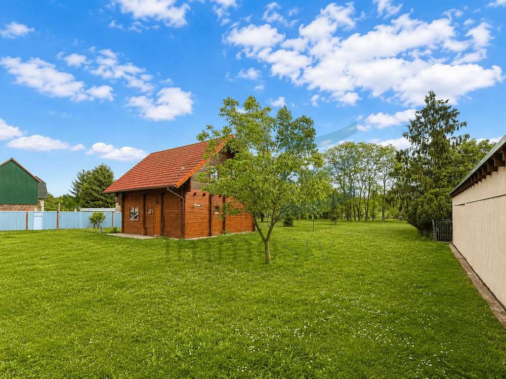 Immobilie in Pessin - Ihr eigenes Stück Natur: Charmantes Holzhaus auf ca. 3.027 m² Grundstück mit viel Freiraum - Bild 3