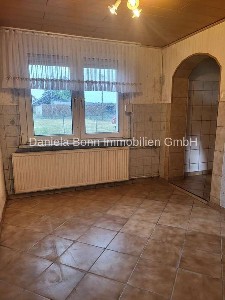 Immobilie in Bedburg - Ruhe trifft Potenzial- 
Grundstück mit Altbestand am Feldrand in Bedburg-Kirchherten! - Bild 2
