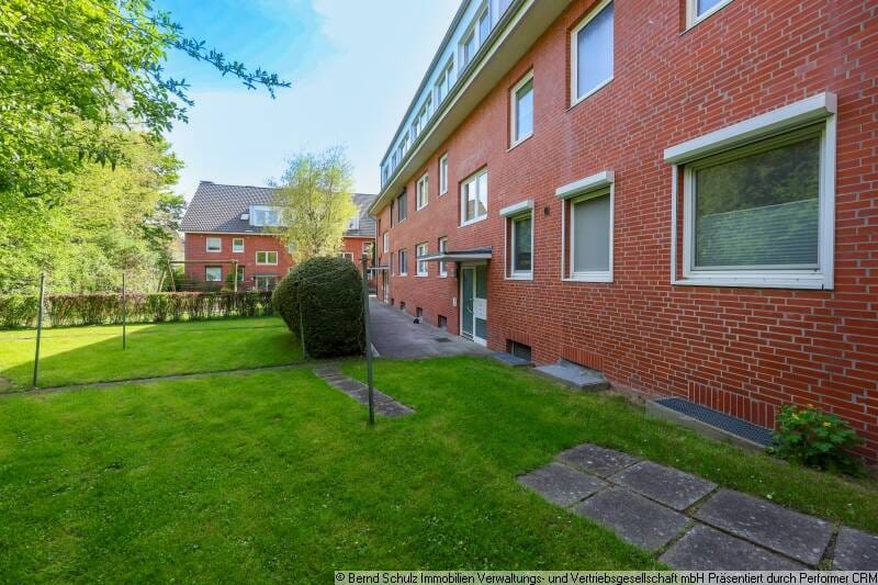 Immobilie in Appen - Modernisierte 4-Zimmer Erdgeschosswohnung mit großem Garten und Stellplatz - Bild 1