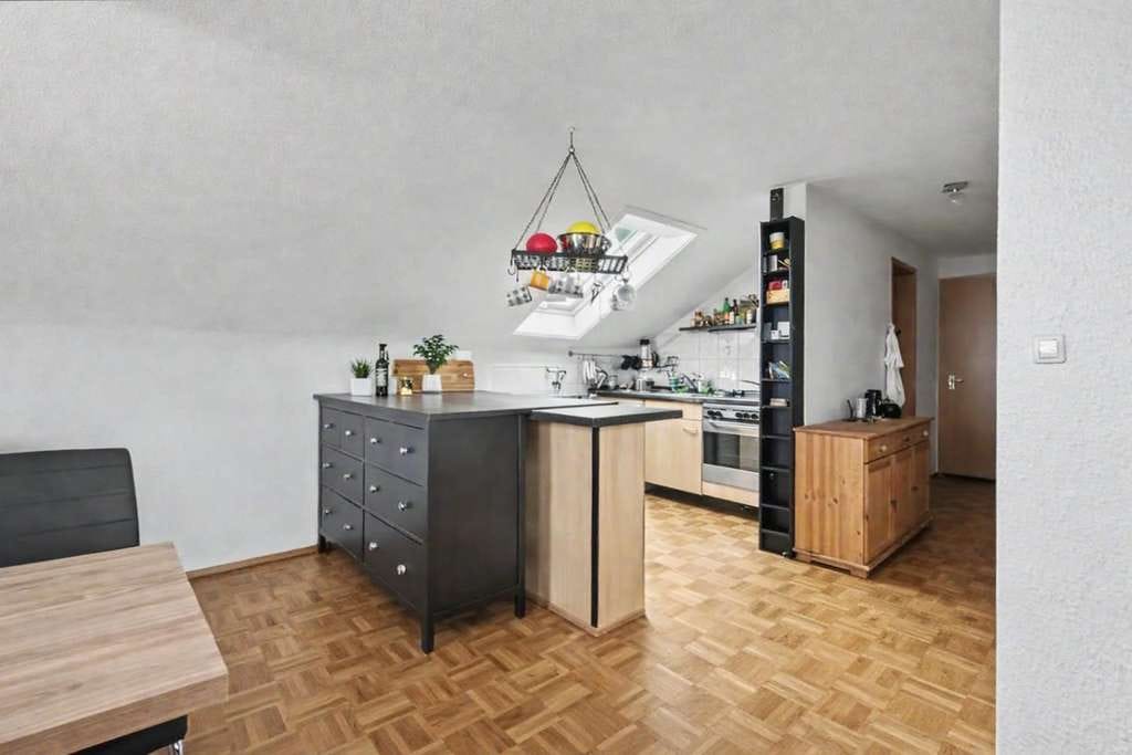 Immobilie in Neckartenzlingen - Helle, vermietete 2-Zimmer-Dachgeschosswohnung in gefragter Lage von Neckartenzlingen - Bild 1
