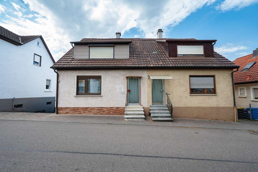 Immobilie in Bad Friedrichshall - Doppelhaushälfte mit großem Garten, Terrasse und Garage in Bad Friedrichshall - Bild 0