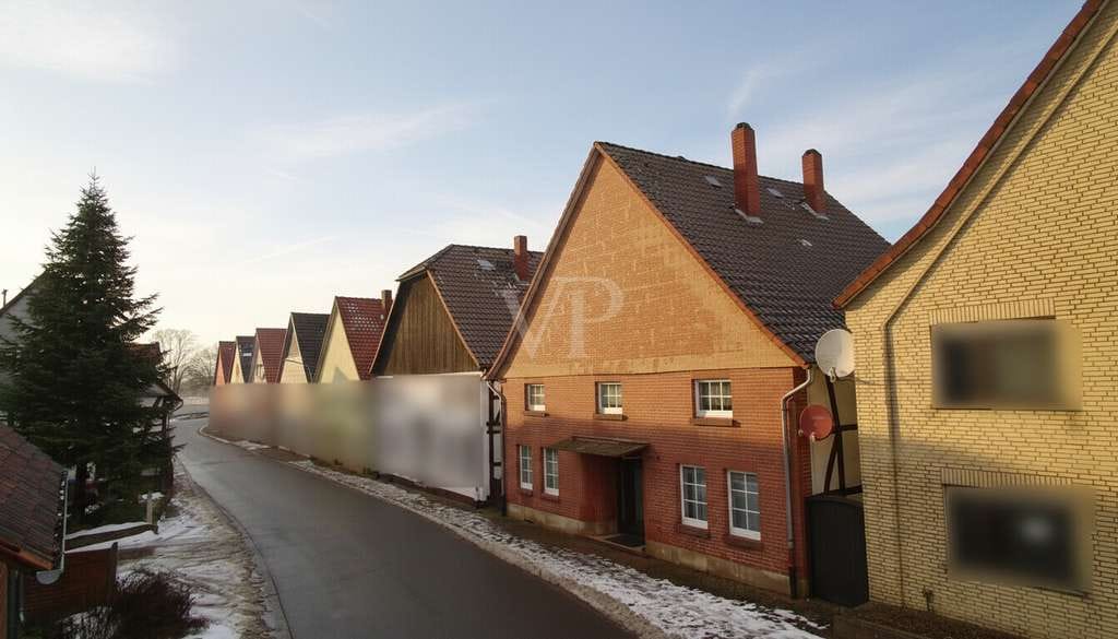 Immobilie in Hessisch Oldendorf - Familiendomizil mit Ausbaupotenzial und gemütlichem Garten in Wesernähe - Bild 1