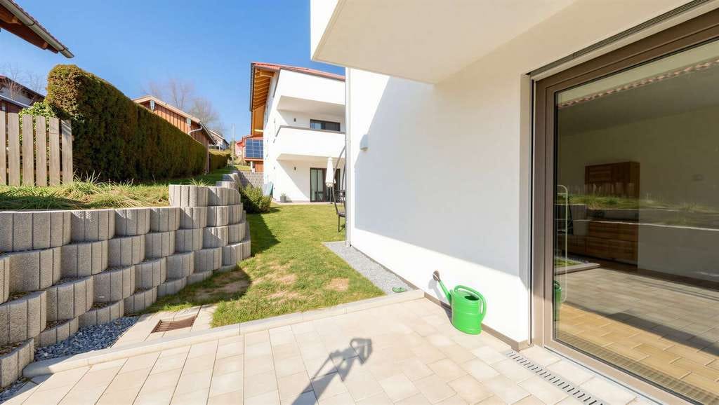 Immobilie in Büchlberg - Neuwertige 2-Zimmer-Wohnung mit Garage und Terrasse im Herzen von Büchlberg - Bild 1