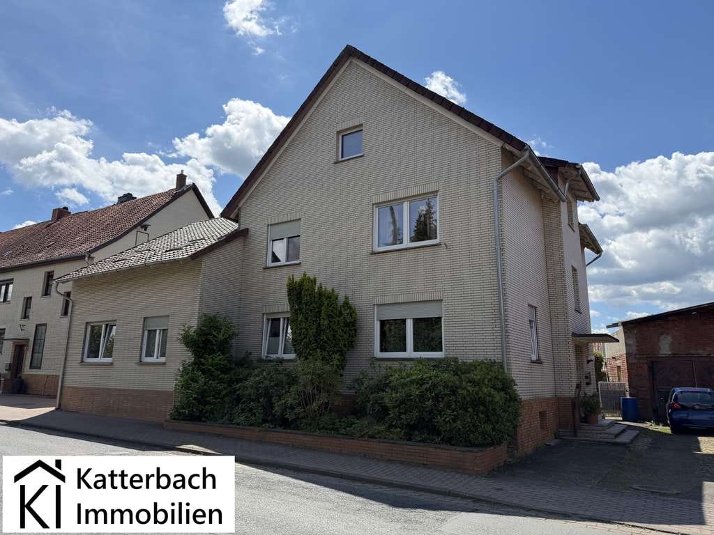 Immobilie in Wulften am Harz - Gepflegtes Zweifamilienhaus mit großem Werkstattgebäude und schönem Grundstück in Wulften - Bild 0