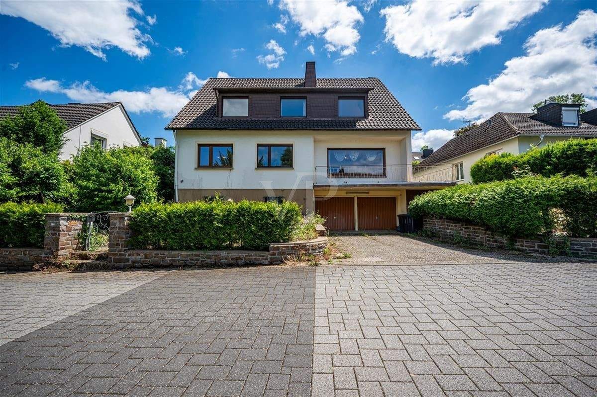 Immobilie in Urbar - Zweifamilienhaus mit sonnigem Grundstück in ruhiger Lage von Urbar - Bild 1