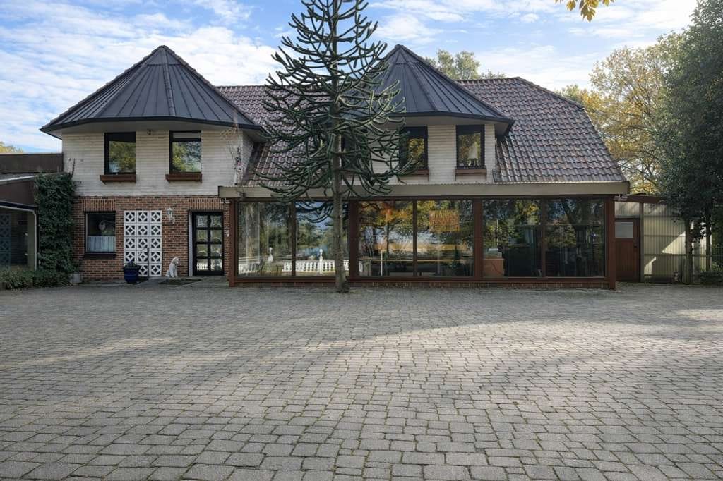 Immobilie in Löningen - *Zweifamilienhaus mit Anbau auf 5.000 m² *Bauantrag für Wohnungen bereits gestellt* - Bild 1