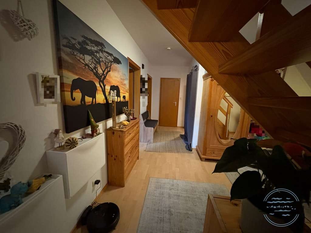 Immobilie in Zetel - Zweifamilienhaus mit Garten und Garage in Zetel zu verkaufen. - Bild 2