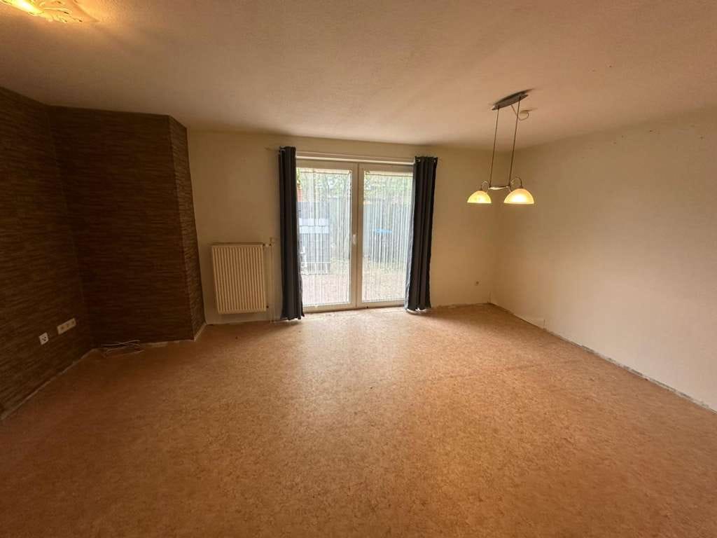 Immobilie in Rhauderfehn - Vielseitig nutzbares Mehrparteienhaus mit drei Wohneinheiten und ca. 250 m² Wohnfläche - Bild 2