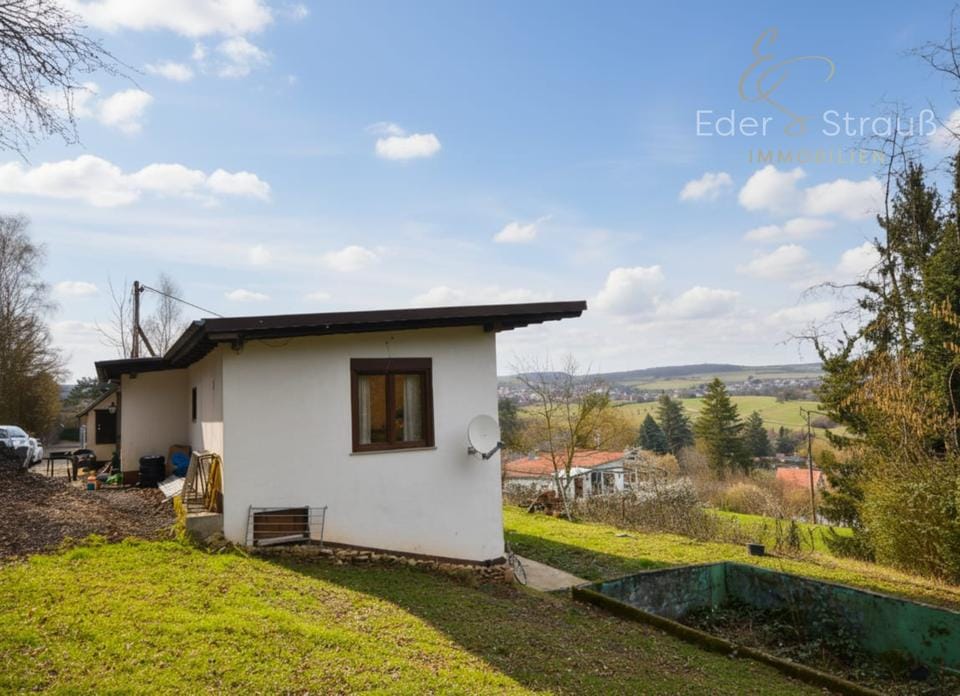 Immobilie in Kleinblittersdorf - Wohnen mit Weitblick: Einfamilienhaus auf 2.050 m² Grundstück in ruhiger Lage von Kleinblittersdorf - Bild 0