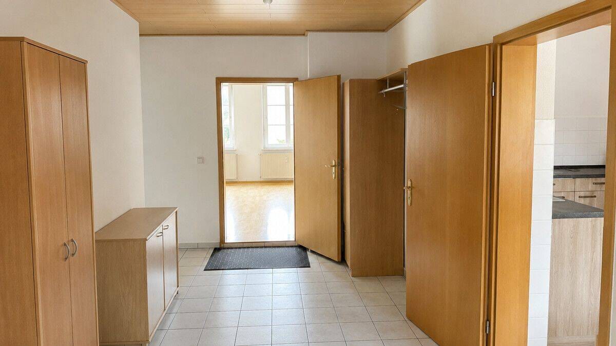 Immobilie in Raguhn-Jeßnitz - Kapitalanlage in Raguhn - drei vermietete Wohnungen mit Außenflächen - Bild 1
