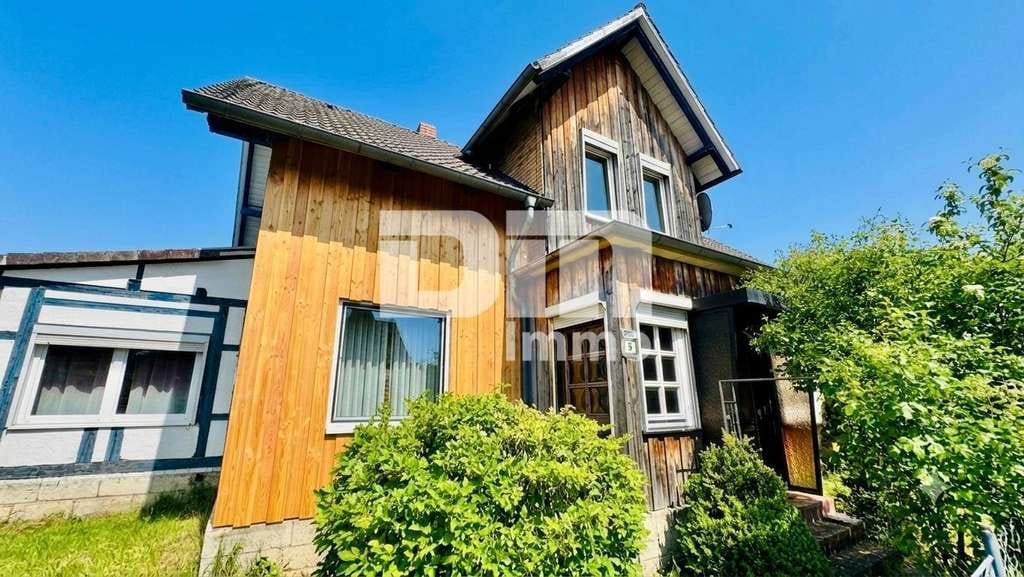 Immobilie in Bad Gandersheim - Charmantes Einfamilienhaus/Resthof mit viel Platz, modernisierter Technik und idyllischem Garten - Bild 2