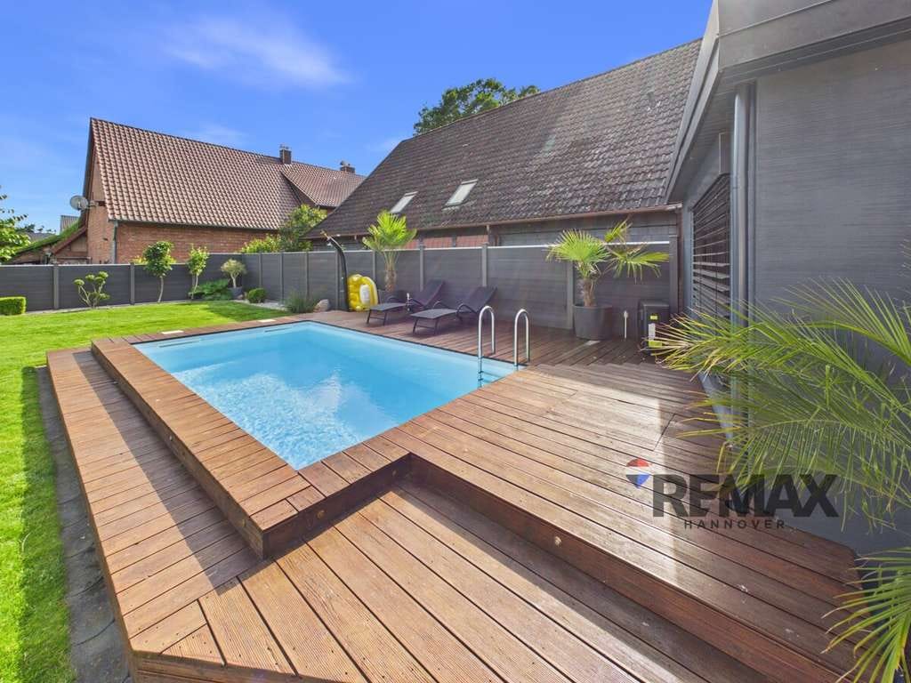 Immobilie in Didderse - Exklusives Doppelanwesen mit Pool - zwei hochwertig sanierte Einfamilienhäuser in ruhiger Lage - Bild 2