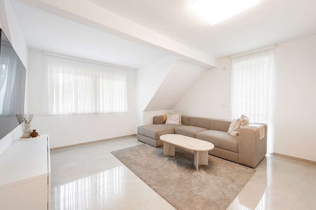 Immobilie in Untergruppenbach - Vermietetes Dachgeschoss‑Apartment mit Luft/Wasser‑Wärmepumpe – gepflegte Kapitalanlage in Untergrup - Bild 0