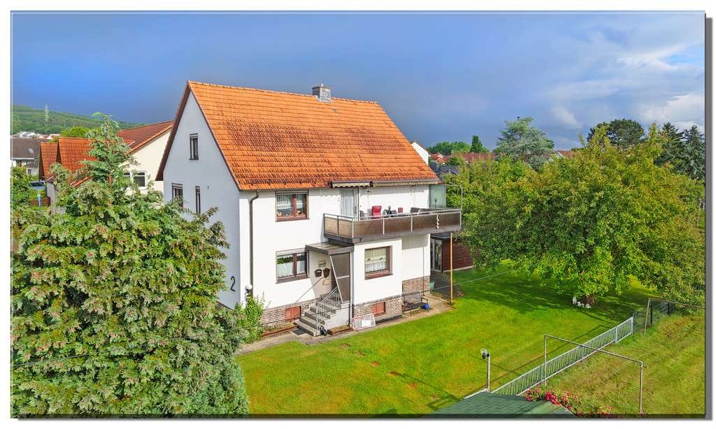 Immobilie in Fuldabrück - 2-Familienhaus mit ausgebautem Dachgeschoss auf großem Grundstück, Dörnhagen - Bild 0