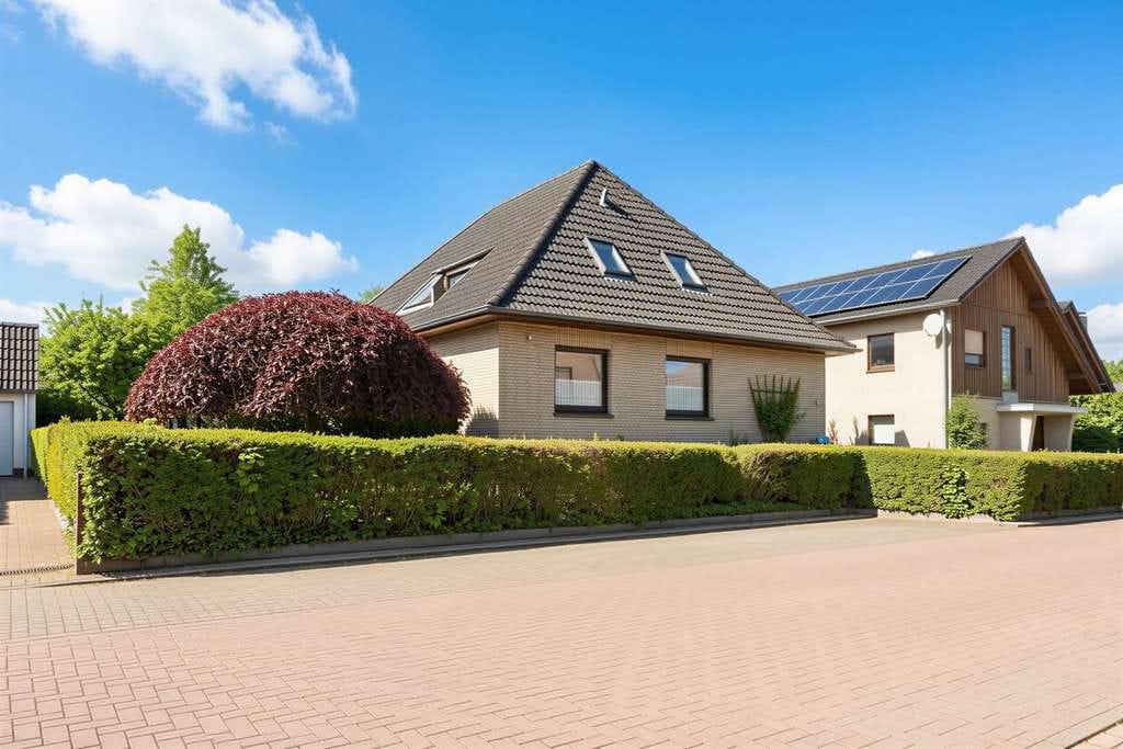 Immobilie in Harpstedt - Familienfreundliches Einfamilienhaus mit Vollkeller und schönem Garten - Bild 1