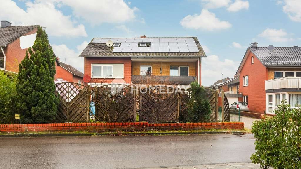 Immobilie in Ladbergen - Wohnen und Vermieten kombinieren: Drei-Parteien-Haus mit Garten, PV-Anlage & stabilen Mieteinnahmen - Bild 0