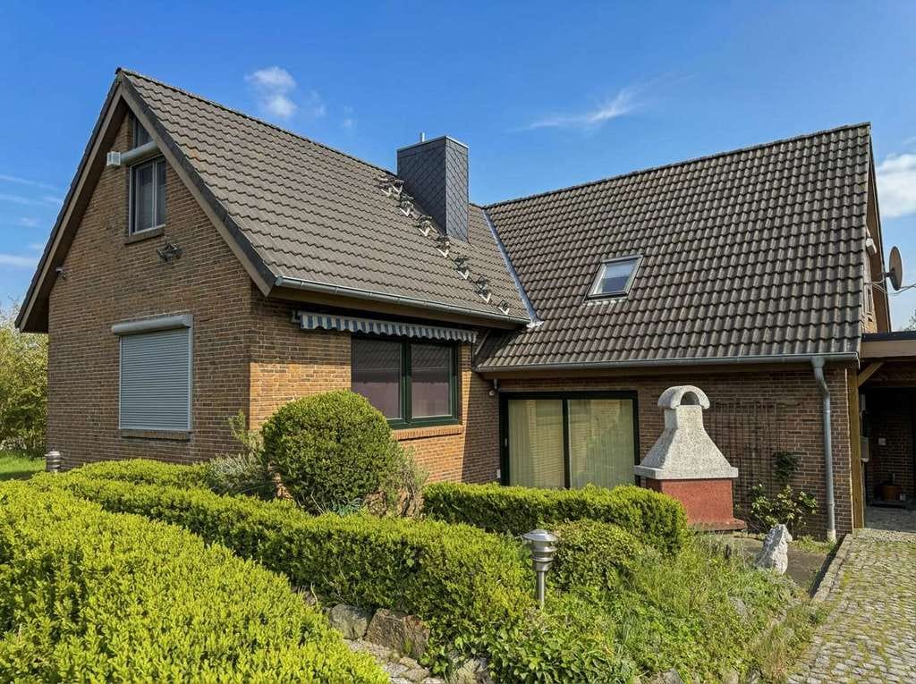 Immobilie in Mildstedt - Einzigartiges Architektenhaus mit großzügigem Garten – Ihr stilvolles Zuhause in Mildstedt - Bild 1