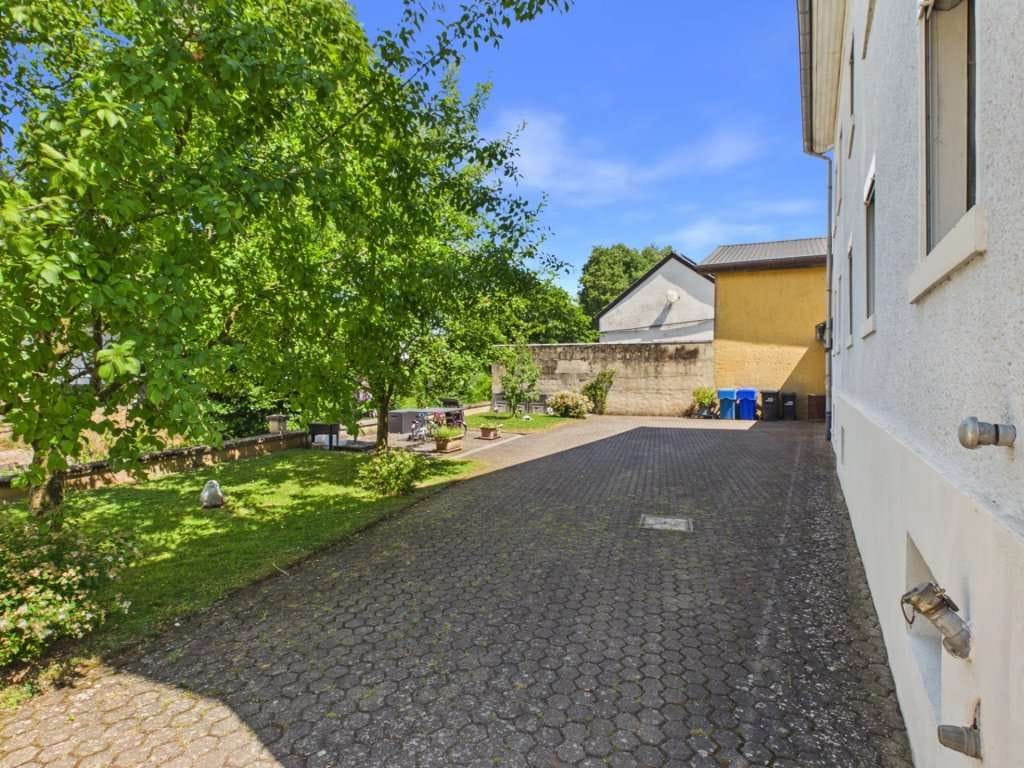 Immobilie in Hüttingen bei Lahr - Wohnen und Vermieten – Gepflegtes Zweifamilienhaus in Hüttingen bei Lahr - Bild 4