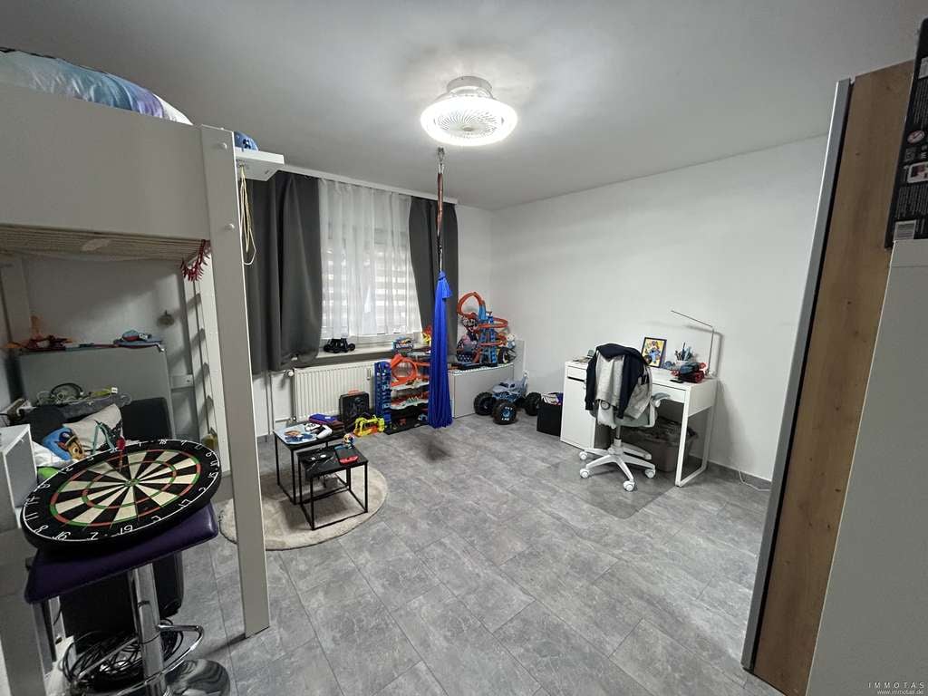 Immobilie in Offenheim - Gepflegtes Mehrfamilienhaus mit 4 Einheiten, voll vermietet, großes Grundstück in ruhiger Lage - Bild 3