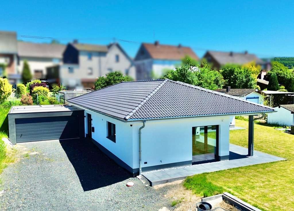 Immobilie in Unnau - **Energieeffizienter Neubau-Bungalow mit besonders hochwertiger Ausstattung in Unnau / Stangenrod** - Bild 2