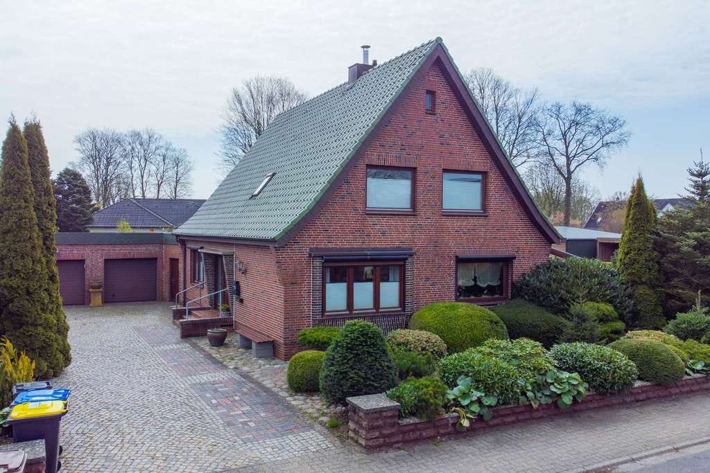 Immobilie in Fockbek - Charmantes Einfamilienhaus mit Einliegerwohnung auf großzügigem und sonnigem Grundstück in Fockbek - Bild 0