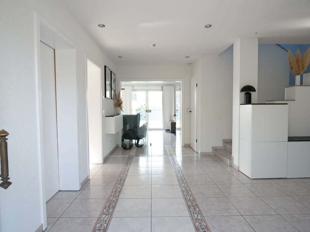 Immobilie in Wendelsheim - Lebensqualität pur - großzügiges Wohnen mit Design, Sauna & Naturblick - Bild 3